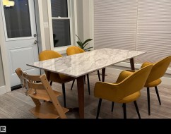 Dining area with light wood-type flooring - 