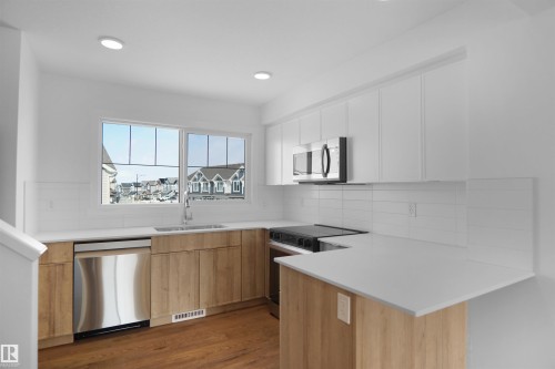 27 531 Merlin Landing, Edmonton, AB - Indoor Photo Showing Kitchen With Upgraded Kitchen