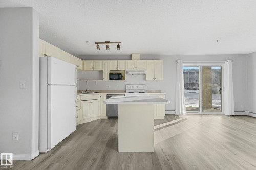 109 16221 95 Street, Edmonton, AB - Indoor Photo Showing Kitchen With Double Sink