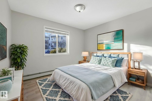 Virtually Staged - 109 16221 95 Street, Edmonton, AB - Indoor Photo Showing Bedroom