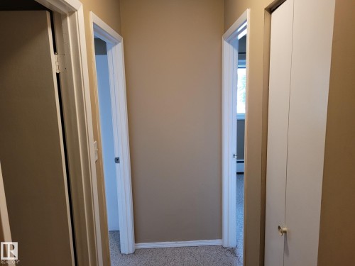 Corridor featuring baseboards - 304A 2908 116A Avenue, Edmonton, AB - Indoor