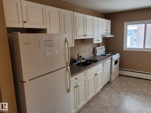 304A 2908 116A Avenue, Edmonton, AB - Indoor Photo Showing Kitchen With Double Sink