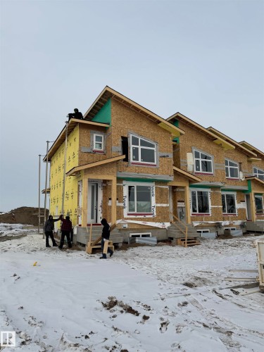 Snow covered back of property with brick siding - 177 Graybriar Drive, Stony Plain, AB - Outdoor