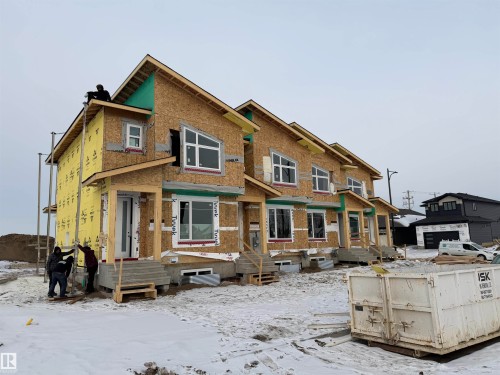 Snow covered house featuring brick siding - 177 Graybriar Drive, Stony Plain, AB - Outdoor