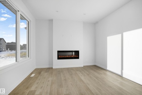 2126 Muckleplum Crescent, Edmonton, AB - Indoor Photo Showing Living Room With Fireplace