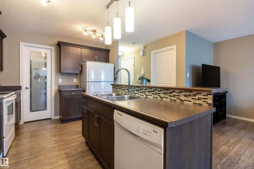 112 Kirpatrick Way, Leduc, AB - Indoor Photo Showing Kitchen With Double Sink