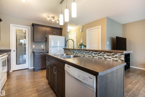 112 Kirpatrick Way, Leduc, AB - Indoor Photo Showing Kitchen With Double Sink