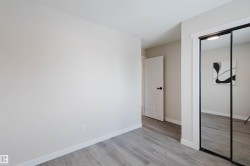 Unfurnished bedroom with light wood finished floors and a closet - 