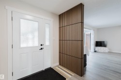 Entrance foyer featuring healthy amount of natural light and light wood-style flooring - 