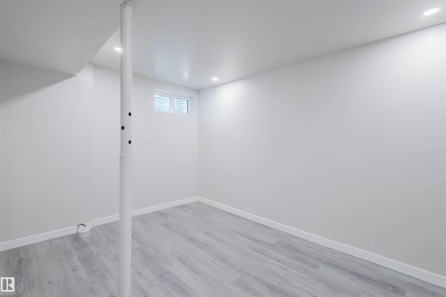 Basement featuring recessed lighting and light wood-style floors - 10423 35 Avenue, Edmonton, AB - Indoor Photo Showing Other Room