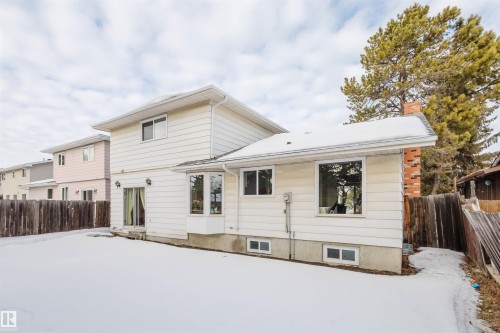 Snow covered property with a chimney - 10423 35 Avenue, Edmonton, AB - Outdoor