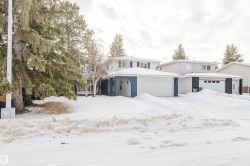 Traditional-style house featuring an attached garage - 