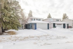 Traditional-style house featuring an attached garage - 