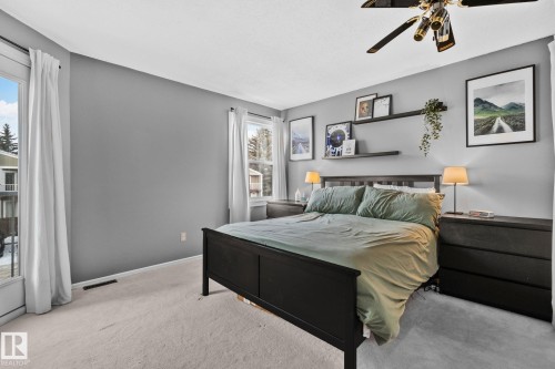 Bedroom with carpet and a ceiling fan - 3 1820 56 Street, Edmonton, AB - Indoor Photo Showing Bedroom