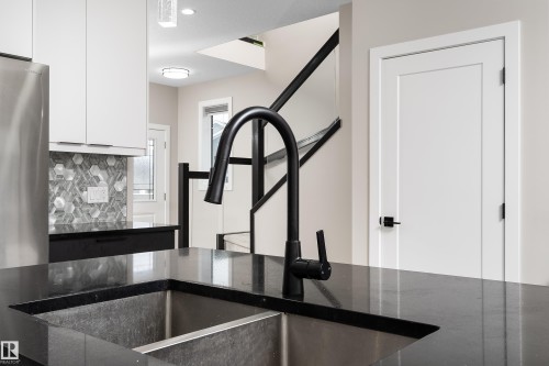 23 Hunter Place, Spruce Grove, AB - Indoor Photo Showing Kitchen With Double Sink