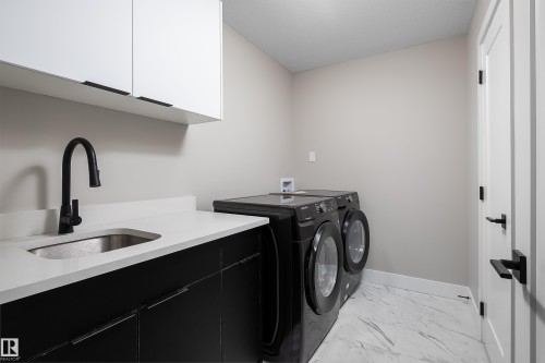 23 Hunter Place, Spruce Grove, AB - Indoor Photo Showing Laundry Room