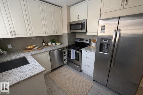 7910 75 Street, Edmonton, AB - Indoor Photo Showing Kitchen With Double Sink With Upgraded Kitchen