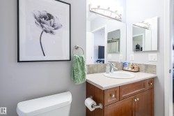 Bathroom featuring toilet and vanity - 