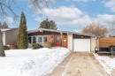 View of front of home featuring brick siding and an attached garage - 2112 67 Street Nw, Edmonton, AB  - Outdoor 