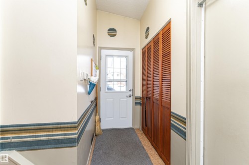 View of side doorway - 2112 67 Street Nw, Edmonton, AB - Indoor Photo Showing Other Room
