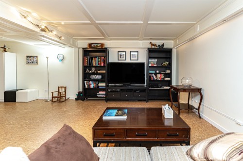 Living room featuring baseboards - 2112 67 Street Nw, Edmonton, AB - Indoor
