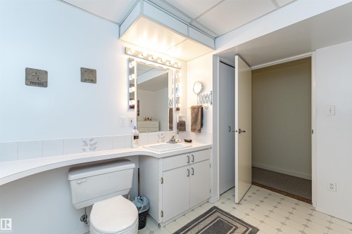 Bathroom with light flooring and vanity - 2112 67 Street Nw, Edmonton, AB - Indoor Photo Showing Bathroom