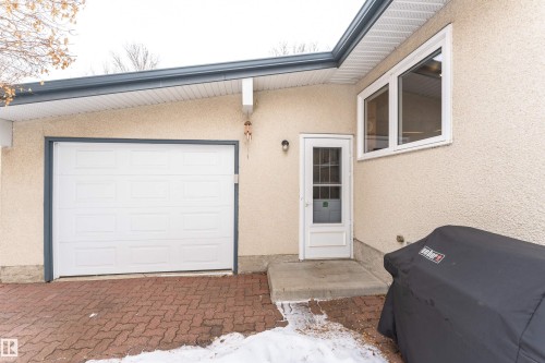 Backyard garage entrance - 2112 67 Street Nw, Edmonton, AB - Outdoor With Exterior