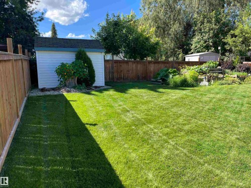 Fenced backyard with a storage shed - 2112 67 Street Nw, Edmonton, AB - Outdoor