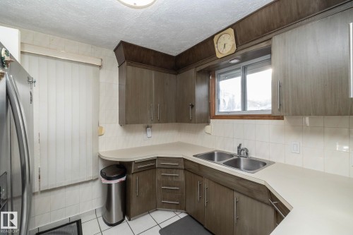 9405 110 Avenue, Edmonton, AB - Indoor Photo Showing Kitchen With Double Sink