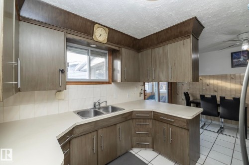 9405 110 Avenue, Edmonton, AB - Indoor Photo Showing Kitchen With Double Sink