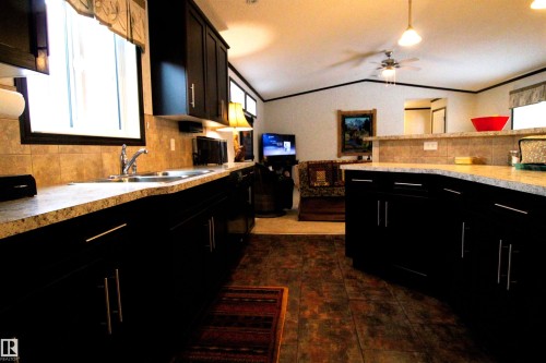 2971 Townsite Crescent, Calling Lake, AB - Indoor Photo Showing Kitchen With Double Sink