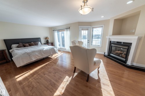 13527 158 Avenue, Edmonton, AB - Indoor Photo Showing Bedroom With Fireplace