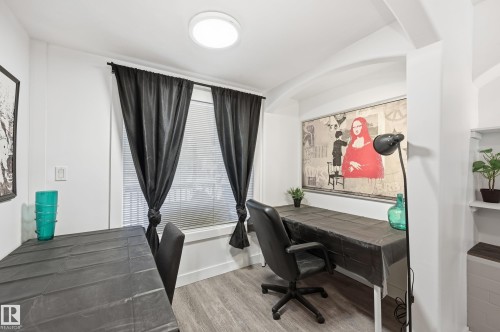 Home office with light wood-style floors and baseboards - 10656 93 Street, Edmonton, AB - Indoor