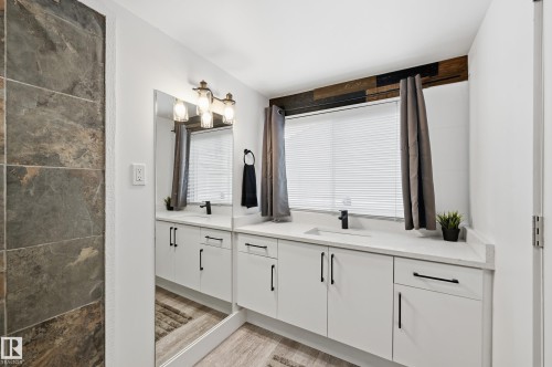 Full bath with double vanity - 10656 93 Street, Edmonton, AB - Indoor Photo Showing Bathroom