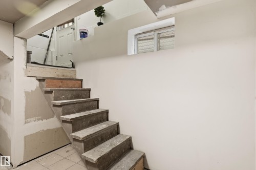 View of stairway - 10656 93 Street, Edmonton, AB - Indoor Photo Showing Other Room
