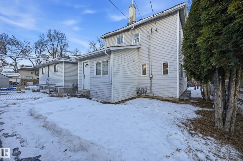 Snow covered house with a chimney - 10656 93 Street, Edmonton, AB - Outdoor