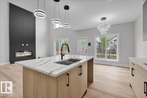 8419 Mayday Link, Edmonton, AB - Indoor Photo Showing Kitchen With Double Sink