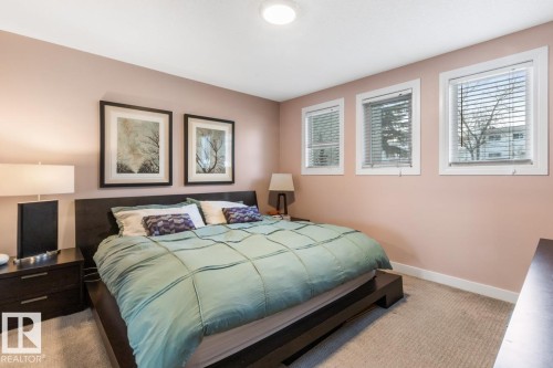 Bedroom with carpet floors and baseboards - 6411 180 Street, Edmonton, AB - Indoor Photo Showing Bedroom