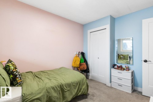 Bedroom featuring carpet flooring and a closet - 6411 180 Street, Edmonton, AB - Indoor Photo Showing Bedroom