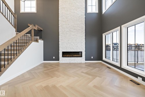 94 Chelles Wynd, St. Albert, AB - Indoor Photo Showing Other Room With Fireplace