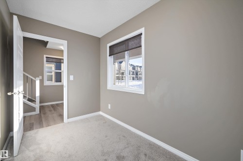 18 2072 Wonnacott Way, Edmonton, AB - Indoor Photo Showing Other Room