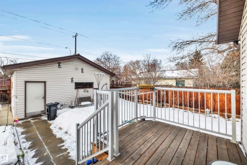 View of snow covered deck - 11432 71 Street, Edmonton, AB - Outdoor With Exterior