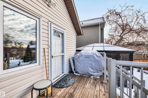 Wooden deck featuring a grill - 11432 71 Street, Edmonton, AB - Outdoor With Deck Patio Veranda With Exterior