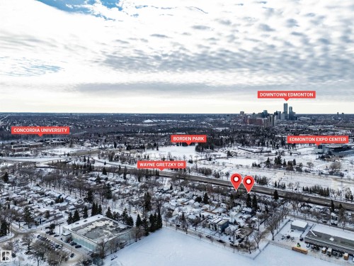 Snowy aerial view featuring a view of city - 11432 71 Street, Edmonton, AB - Outdoor With View