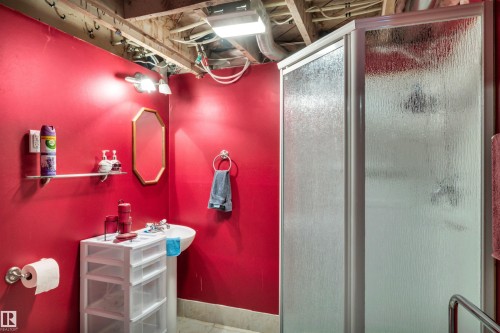 Full bathroom with a stall shower - 11432 71 Street, Edmonton, AB - Indoor Photo Showing Bathroom