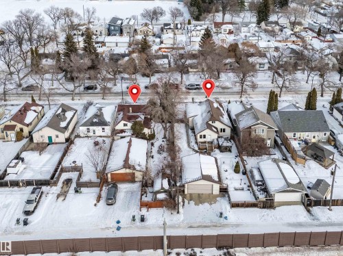 Snowy aerial view featuring a residential view - 11432 71 Street, Edmonton, AB - Outdoor With View