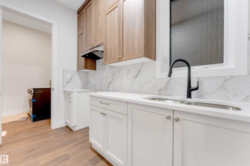 7663 Kimiwan Crescent, Edmonton, AB - Indoor Photo Showing Kitchen With Double Sink