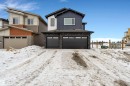 View of front facade with a garage and brick siding - 40 Grayson Green, Stony Plain, AB  - Outdoor 
