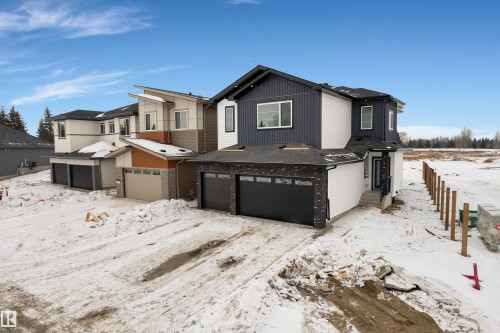 View of front of house with a garage and roof with shingles - 40 Grayson Green, Stony Plain, AB - Outdoor
