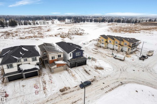 Snowy aerial view featuring a residential view - 40 Grayson Green, Stony Plain, AB - Outdoor With View